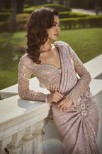 Jeweled Blouse with a Net Textured Drape Saree