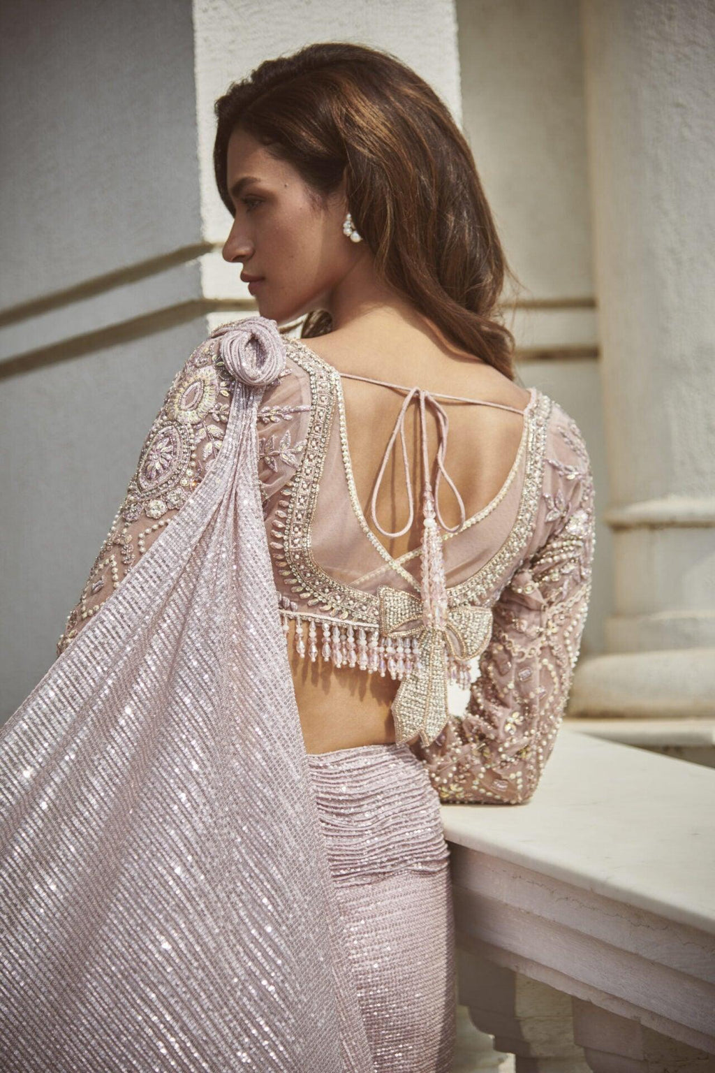 Jeweled Blouse with a Net Textured Drape Saree