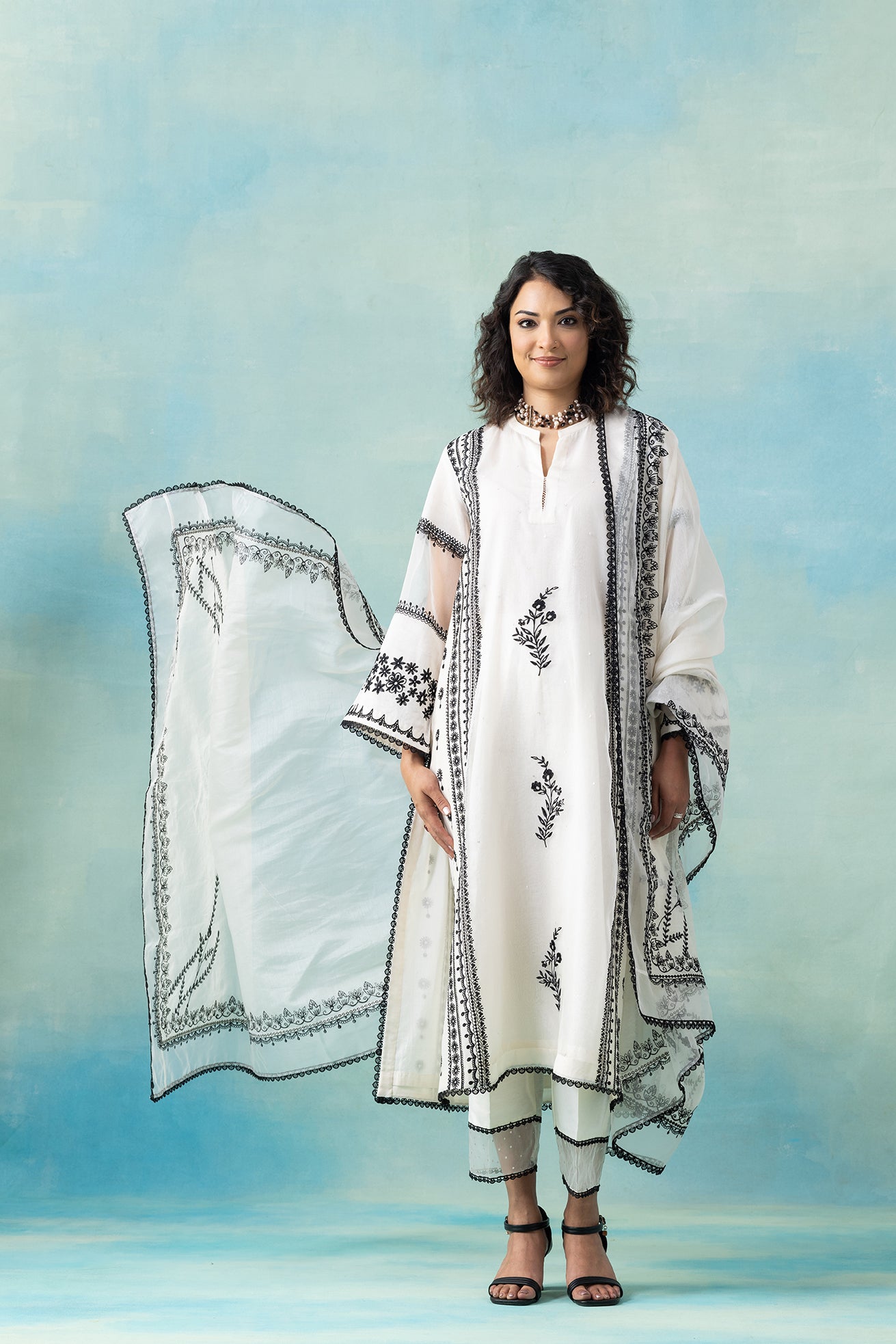 Rajasi Border Kurta Set